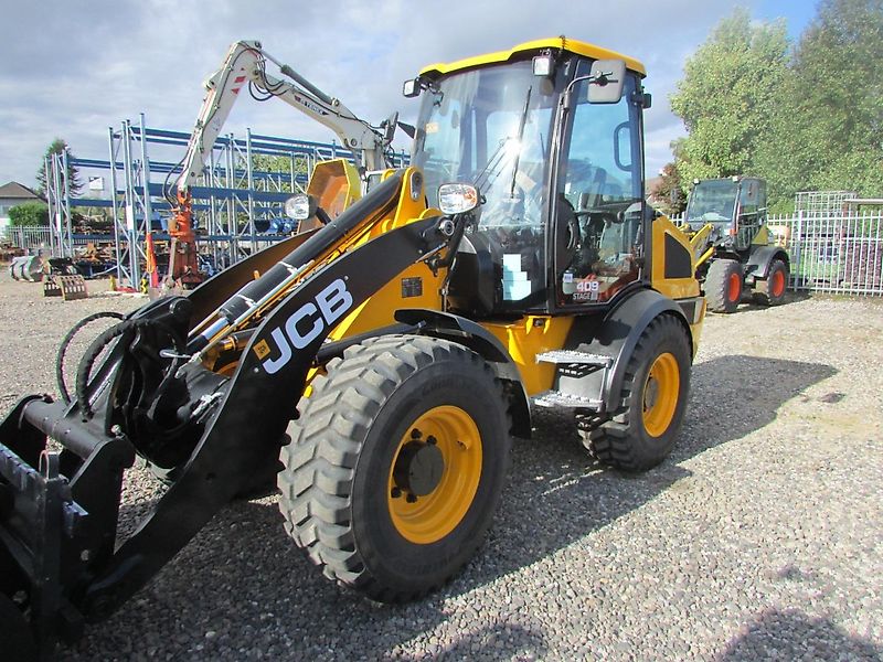 JCB 409 Radlader mit Schaufel und Gabel