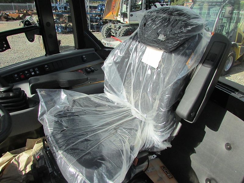 JCB 409 Radlader mit Schaufel und Gabel