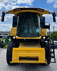 New Holland CX 5.80 inkl. 6,10m Varifeed & Wagen