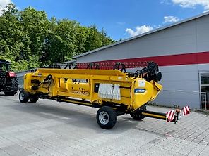 New Holland CX 5.80 inkl. 6,10m Varifeed & Wagen